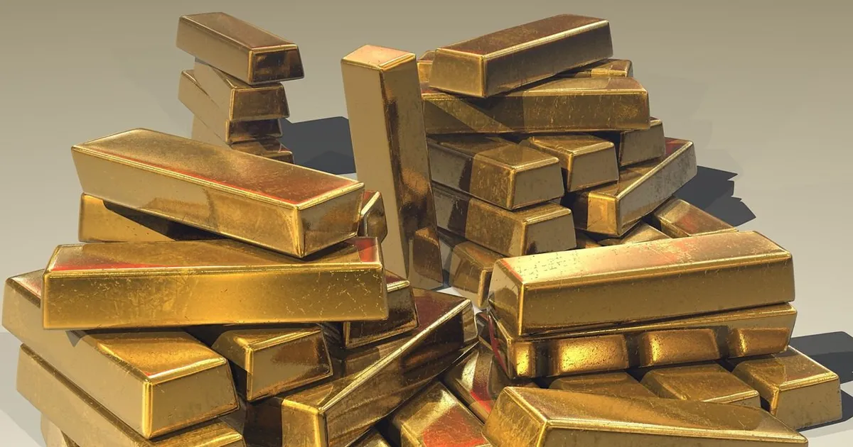 Ouro recua com escalada de tensão no Oriente Médio e à espera da ata do Fed